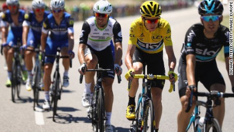 Chris Froome rides in the yellow Jersey for Team Sky during the 14th stage from Montelimar to Villars-les-Dombes Parc des Oiseaux.