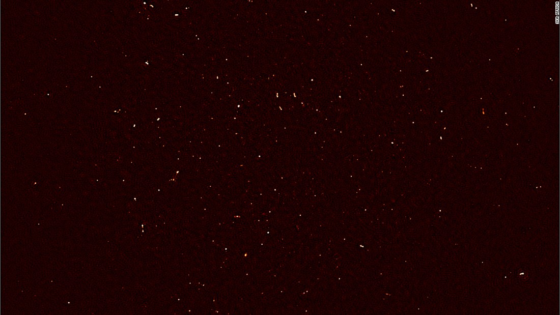 MeerKAT&#39;s First Light image. Each white dot represents the intensity of radio waves recorded with 16 dishes of the MeerKAT telescope in the Karoo desert. &lt;br /&gt;&lt;br /&gt;More than 1,300 individual objects - galaxies in the distant universe - are seen in this image.