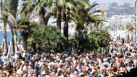 Thousands gather to observe a minute of silence at noon Monday on Nice&#39;s Promenade des Anglais. 