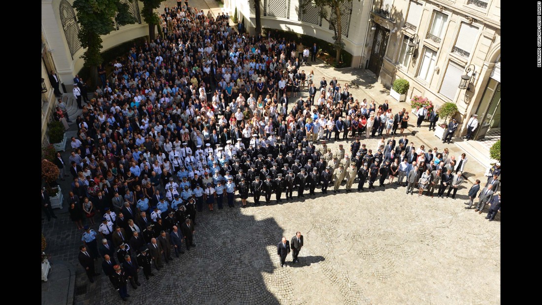 A ceremony is held at the Hotel de Beauvau at the French Interior Ministry to observe a moment&#39;s silence to honor those killed in the truck attack.