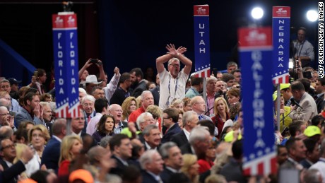 Delegates protest onm the floor on the first day of the Republican National Convention on July 18, 2016 at the Quicken Loans Arena in Cleveland, Ohio. An estimated 50,000 people are expected in Cleveland, including hundreds of protesters and members of the media. The four-day Republican National Convention kicks off on July 18.