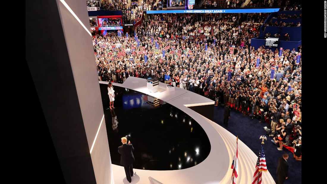 Donald Trump walks to his wife after she delivered her speech.