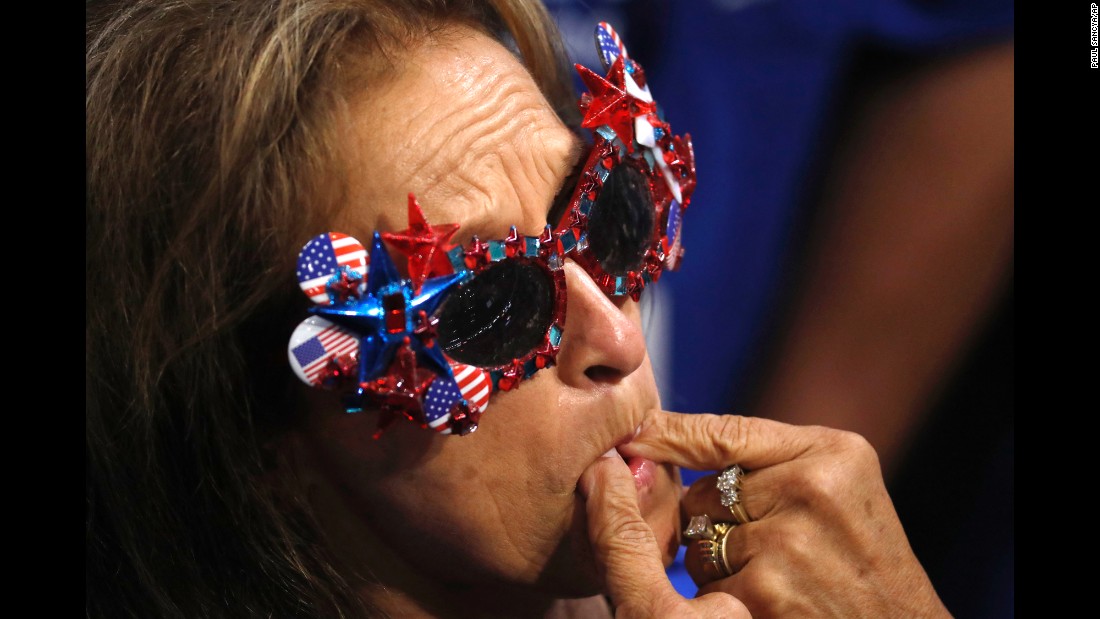 A delegate whistles as roll call votes are cast on Tuesday.