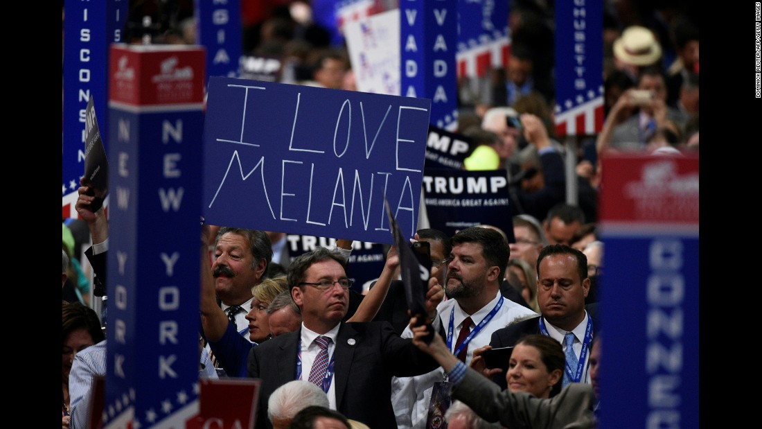 A delegate shows support for Donald Trump&#39;s wife, Melania, on Tuesday.