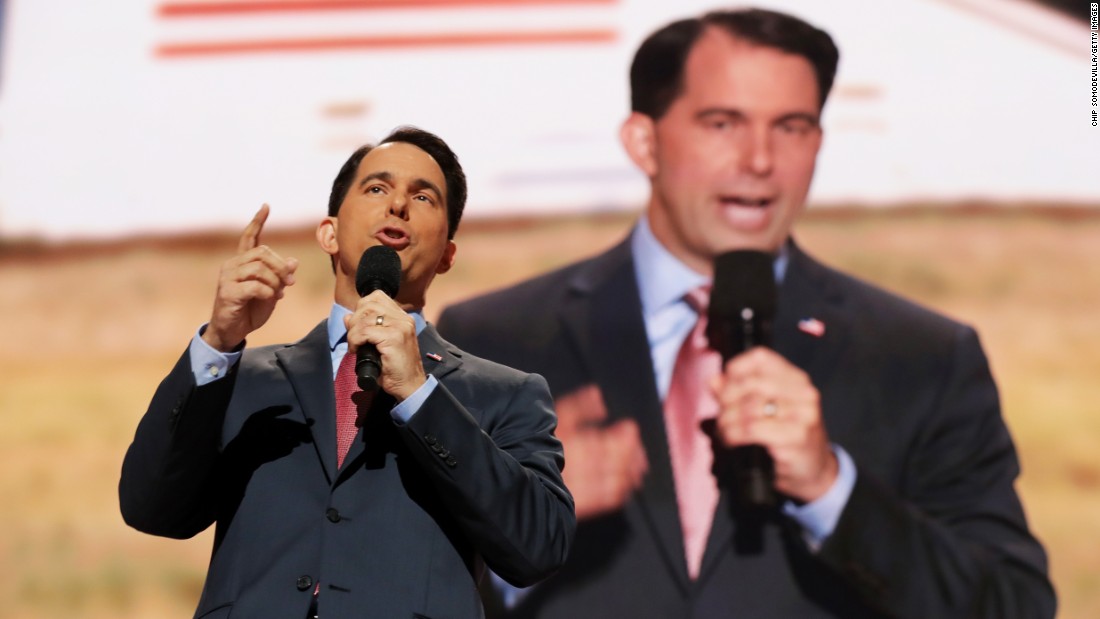 Wisconsin Gov. Scott Walker delivers a speech Wednesday. &quot;A vote for anyone other than Donald Trump in November is a vote for Hillary Clinton,&quot; the former presidential candidate said.