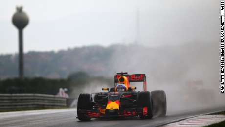  Daniel Ricciardo of Red Bull drives through the rain during qualifying for the Hungarian Grand Prix.