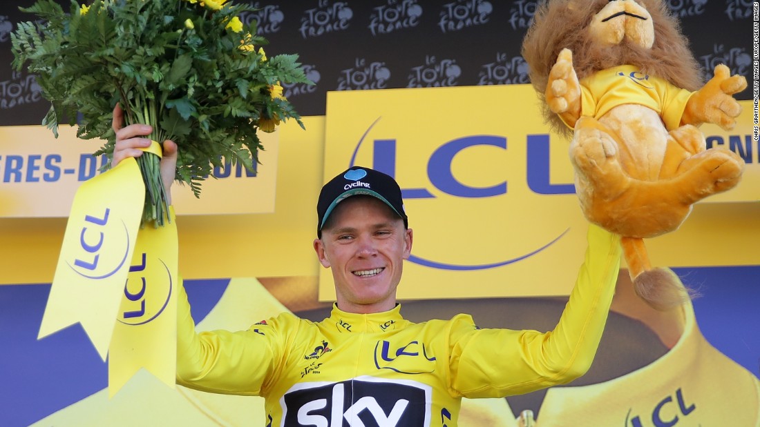 A happy Froome becomes reacquainted with the yellow jersey at the end of the stage.
