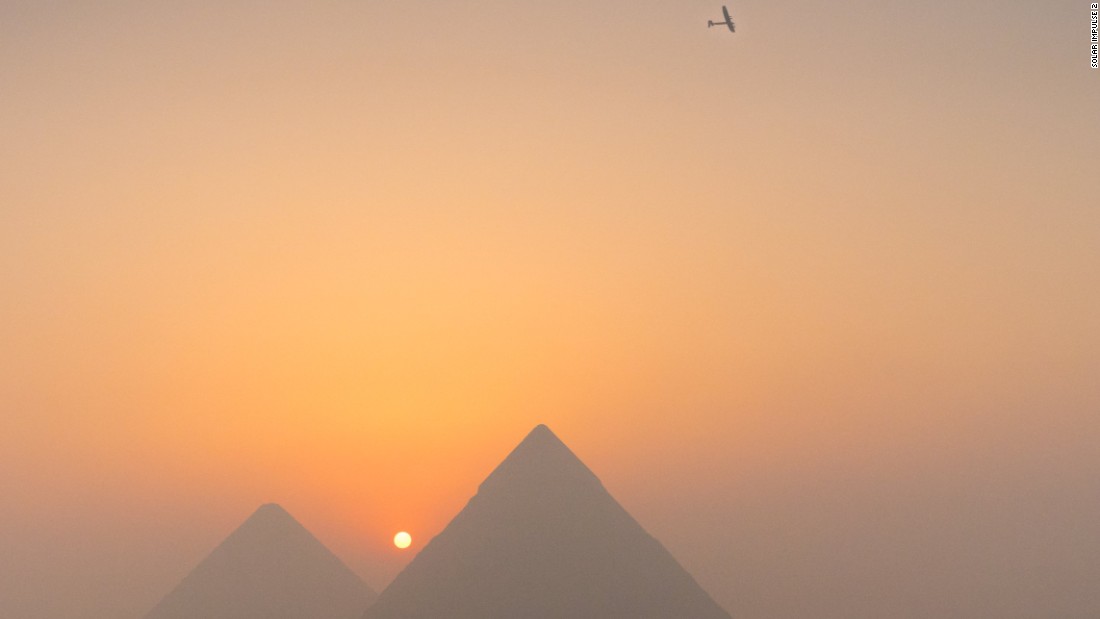 Solar Impulse 2, seen above the Pyramids of Giza on its approach to Cairo, Egypt. 