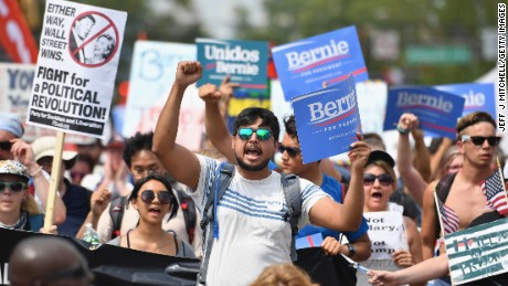 Bernie Sanders supporters march through downtown on the first day of the Democratic National Convention (DNC) on July 25, 2016 in Philadelphia, Pennsylvania. The convention is expected to attract thousands of protesters, members of the media and Democratic delegates to the City of Brotherly Love.