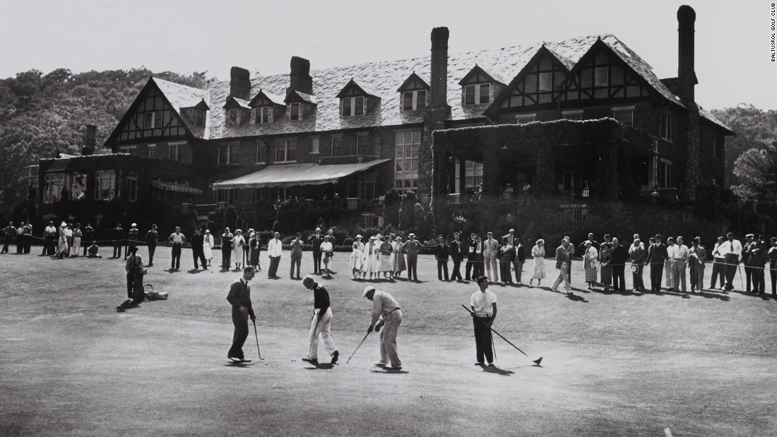 Players practice putting in front of the clubhouse in 1936. Originally a converted barnhouse -- the course was built on a farm -- it burned down in 1909 and was rebuilt in a Tudor revival style.