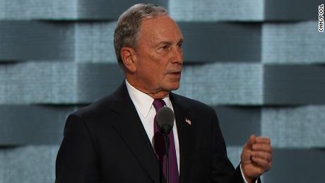 Bloomberg re-registers as a Democrat, saying the party must provide 'checks and balances'