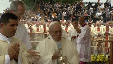 Pope Francis falls during service