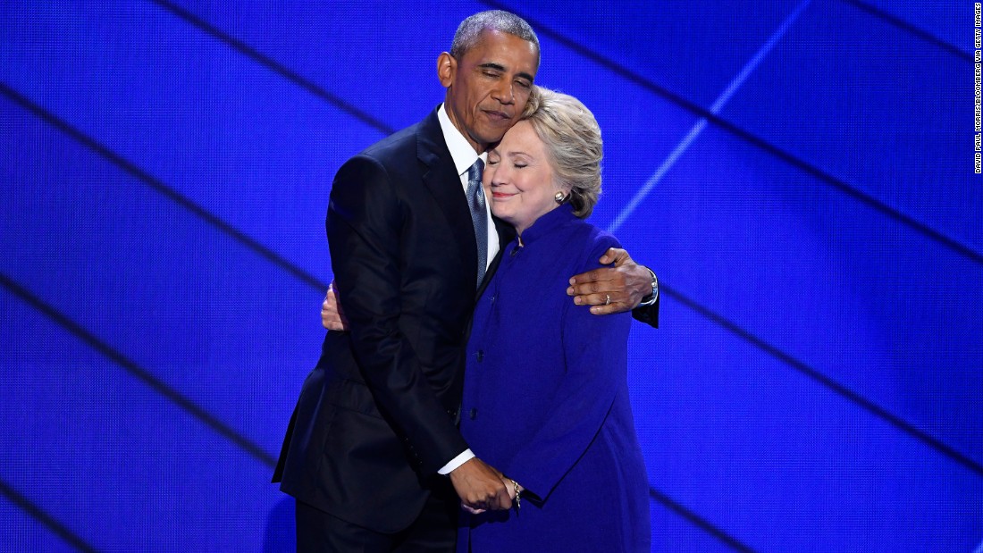 In a symbol of American optimism and activism, President Barack Obama embraces Hillary Clinton at the Democratic National Convention.