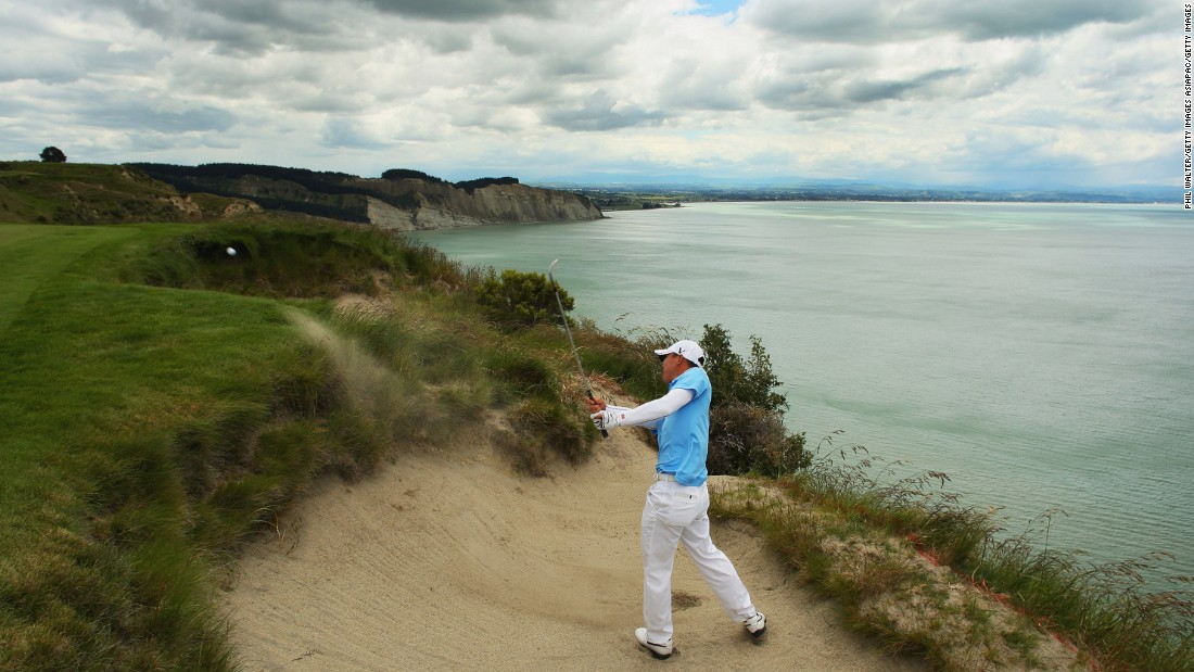 Doak&#39;s other top-100 course is Cape Kidnappers in New Zealand, set on the rugged Hawke&#39;s Bay coast. Here American golfer Anthony Kim plays out of a bunker during a 2009 tournament. 