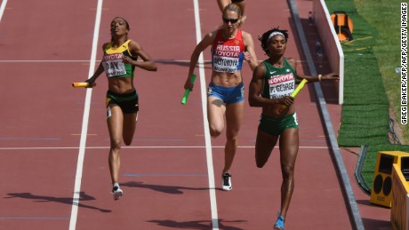 Nigeria&#39;s Patience Okon George finishes the qualifying round of the women&#39;s 4x400 metres relay athletics event at the 2015 IAAF World Championships in Beijing.