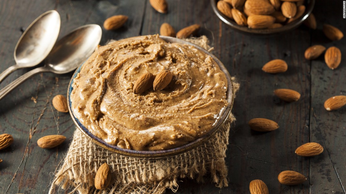 Nuts and nut butters, such as peanut butter or almond butter, contain plant protein.