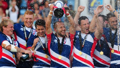 Great Britain Royals captain Luke Treharne lifts the trophy after beating France in the final of the Rugby Europe Sevens event in Exeter.