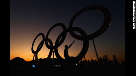 RIO DE JANEIRO, BRAZIL - AUGUST 01:  The sun sets over the Olympic Rings on the Olympic Park on August 1, 2016 in Rio de Janeiro, Brazil.  (Photo by Clive Rose/Getty Images)