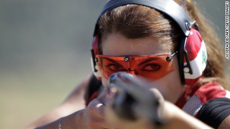 Lebanese Trap Champion Ray Bassil gives a thumbs-up sign as she trains for the 2012 Summer Olympic Games in London at a shooting club in Ghadras north of Beirut on July 13, 2012. AFP PHOTO/JOSEPH EID        (Photo credit should read JOSEPH EID/AFP/GettyImages)
