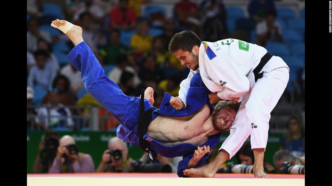 Tobias Englmaier of Germany, left, competes against Francisco Garrigos of Spain in the men&#39;s 60kg judo.