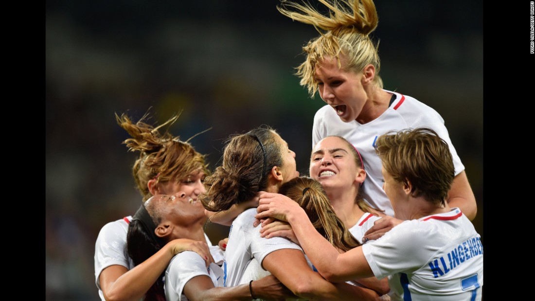 Carli Lloyd of United States celebrates with her team after scoring during the women&#39;s Group G first round match between United States and France. The United States won the match 1-0.
