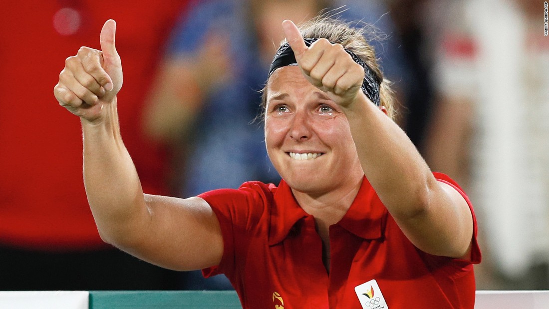 Belgium&#39;s Kirsten Flipkens cries after defeating Venus Williams of the United States in the women&#39;s tennis competition 4-6, 6-3, 7-6.