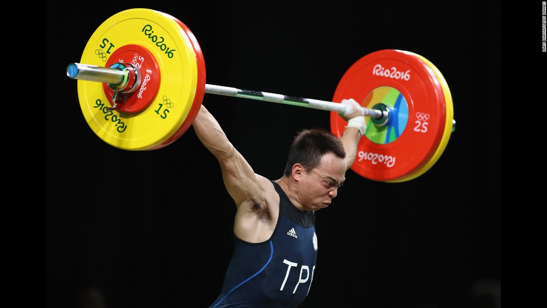 Chi-Chung Tan of Chinese Taipei competes during the men&#39;s 53kg Group A weightlifting contest.