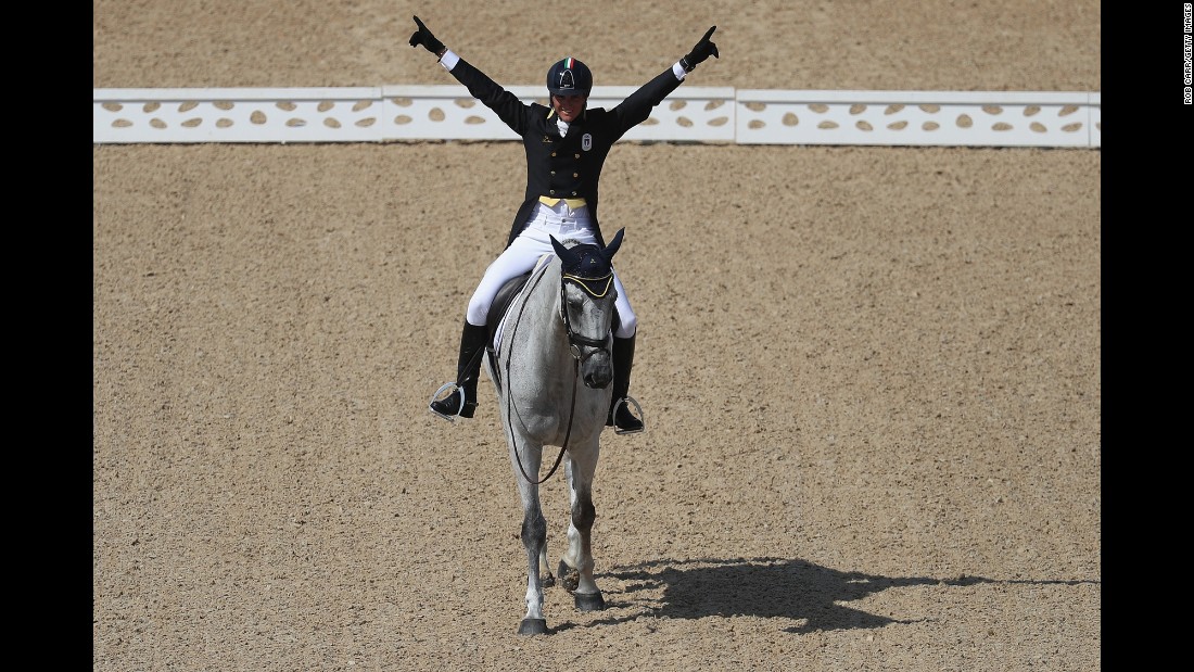 Pietro Roman of Italy riding Barraduff reacts after competing in the Eventing Team Dressage event.