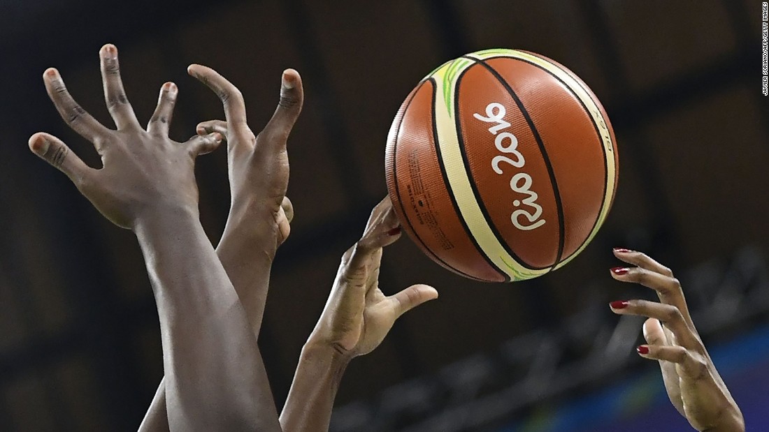 Players reach out to the ball during the women&#39;s basketball match between USA and Senegal. The Americans won 121-56, &lt;a href=&quot;http://edition.cnn.com/2016/08/02/sport/team-usa-womens-basketball-rio-2016/index.html&quot; target=&quot;_blank&quot;&gt;setting a new record &lt;/a&gt;for the most points scored in Olympic history.