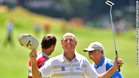 Jim Furyk celebrates his record-breaking round at the Travelers Championship.