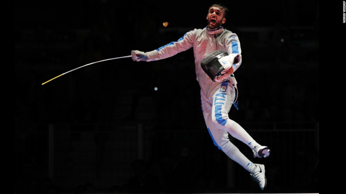 Daniele Garozzo of Italy celebrates after defeating Alexander Massialas of the United States, winning the gold medal at the men&#39;s individual foil fencing event.
