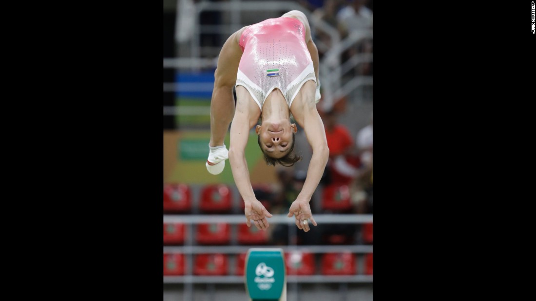 Uzbekistan&#39;s Oksana Chusovitina performs on the balance beam during the artistic gymnastics women&#39;s qualification round. At 41, she is the oldest gymnast to ever compete in the Olympics.