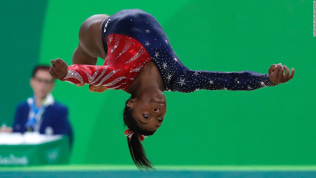 American gymnast Simone Biles leads the field in the women&#39;s individual all-around competition at the end of the second day of the Olympics. 