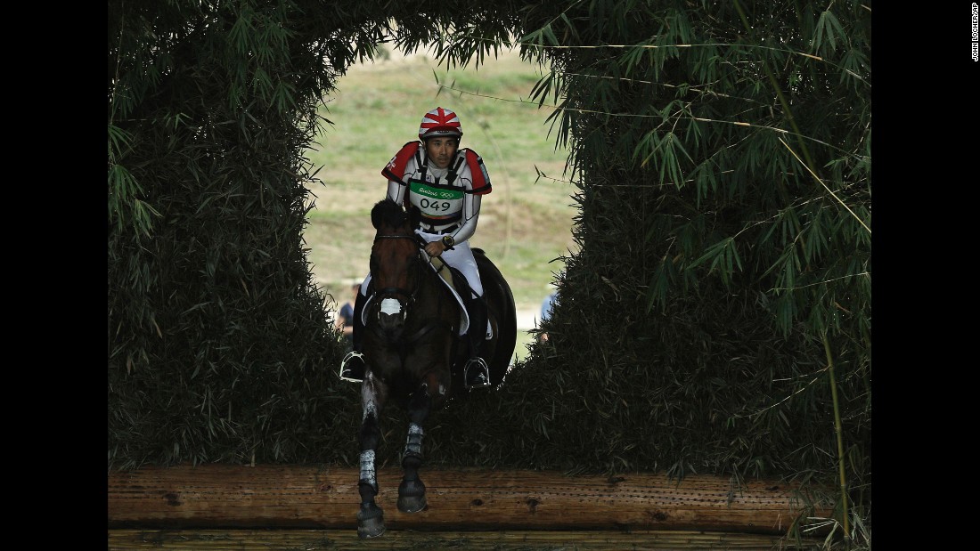 Japanese rider Yoshiaki Oiwa, on The Duke of Cavan, competes in the cross-country phase of the eventing competition.