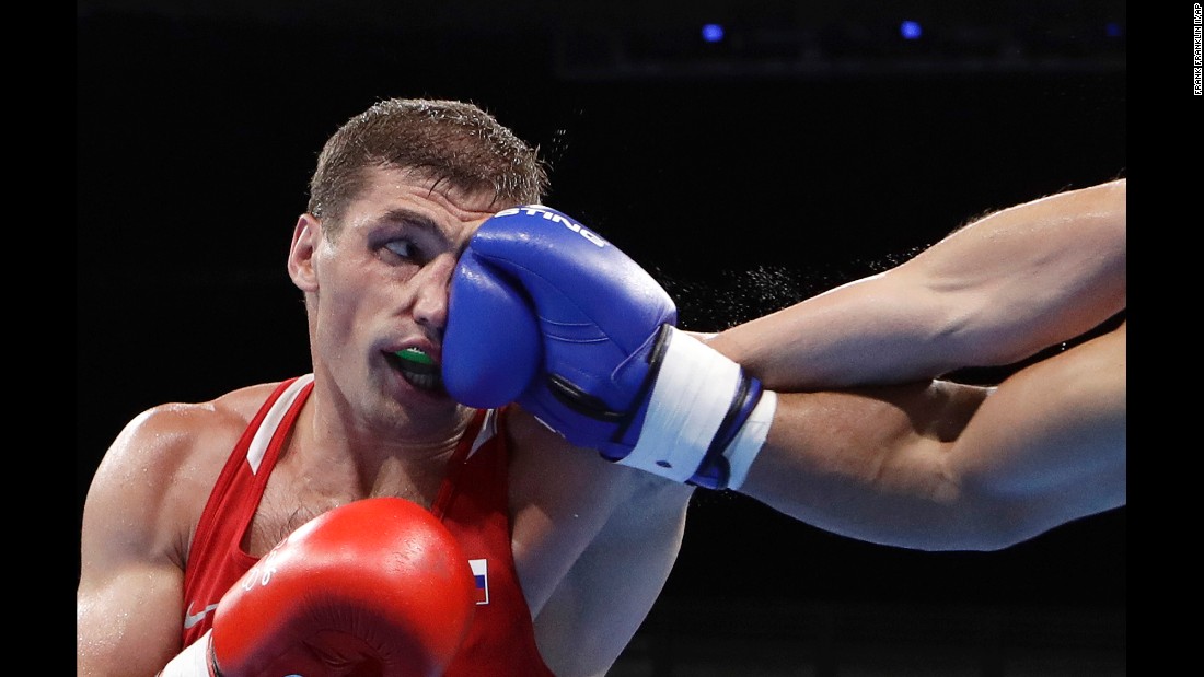 Petr Khamukov, a light-heavyweight boxer from Russia, is punched by Venezuela&#39;s Albert Ramirez during a preliminary match on Sunday, August 7. Ramirez won the bout to advance to the round of 16.