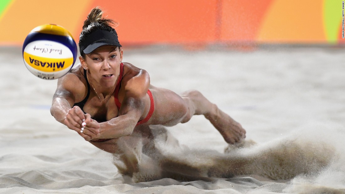 Canada&#39;s Jamie Lynn Broder dives for the ball during a beach volleyball match on Sunday, August 7.