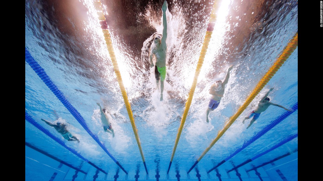 Russia&#39;s Aleksandr Krasnykh leads a group of swimmers during a 400-meter freestyle race on Saturday, August 6.