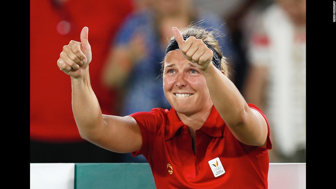 Belgian tennis player Kirsten Flipkens cries after she defeated American Venus Williams on Saturday, August 6.