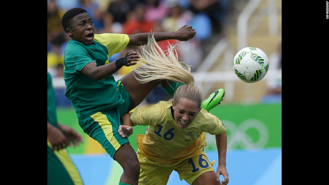 South Africa&#39;s Nothando Vilakazi, left, competes with Sweden&#39;s Elin Rubensson during the opening soccer match on Wednesday, August 3. Sweden won 1-0.