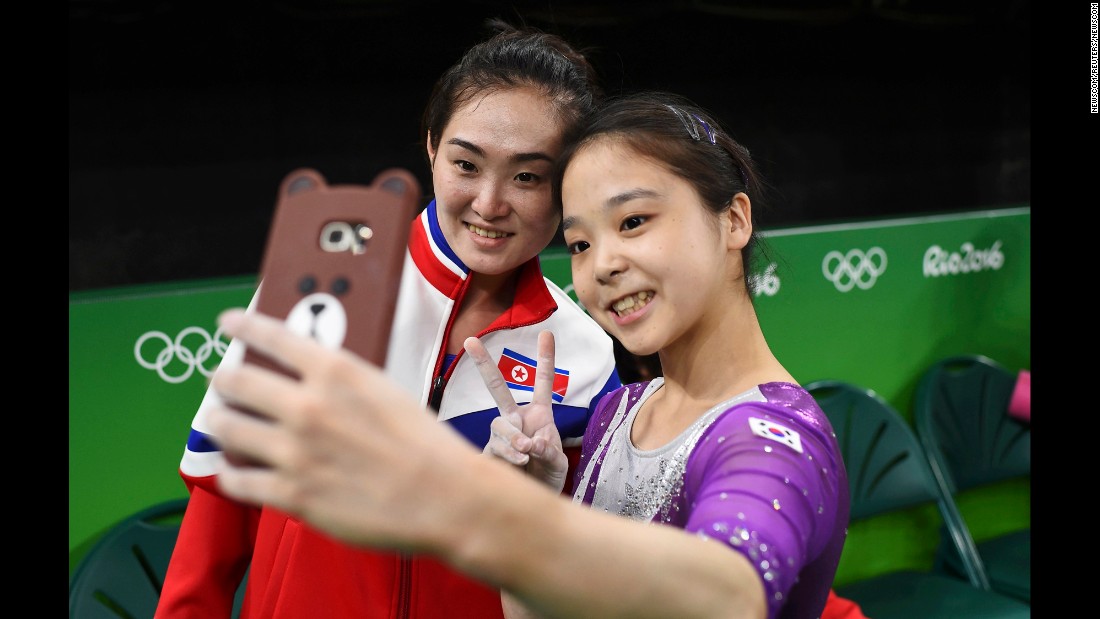 South Korean gymnast Lee Eun-ju &lt;a href=&quot;http://www.cnn.com/2016/08/08/sport/korea-gymnast-selfie/index.html&quot; target=&quot;_blank&quot;&gt;takes a selfie&lt;/a&gt; with North Korean gymnast Hong Un-jong during training. Relations have been frosty between the North and South since its division following the end of World War II, but geopolitics were put to the side as the two Olympians came together.