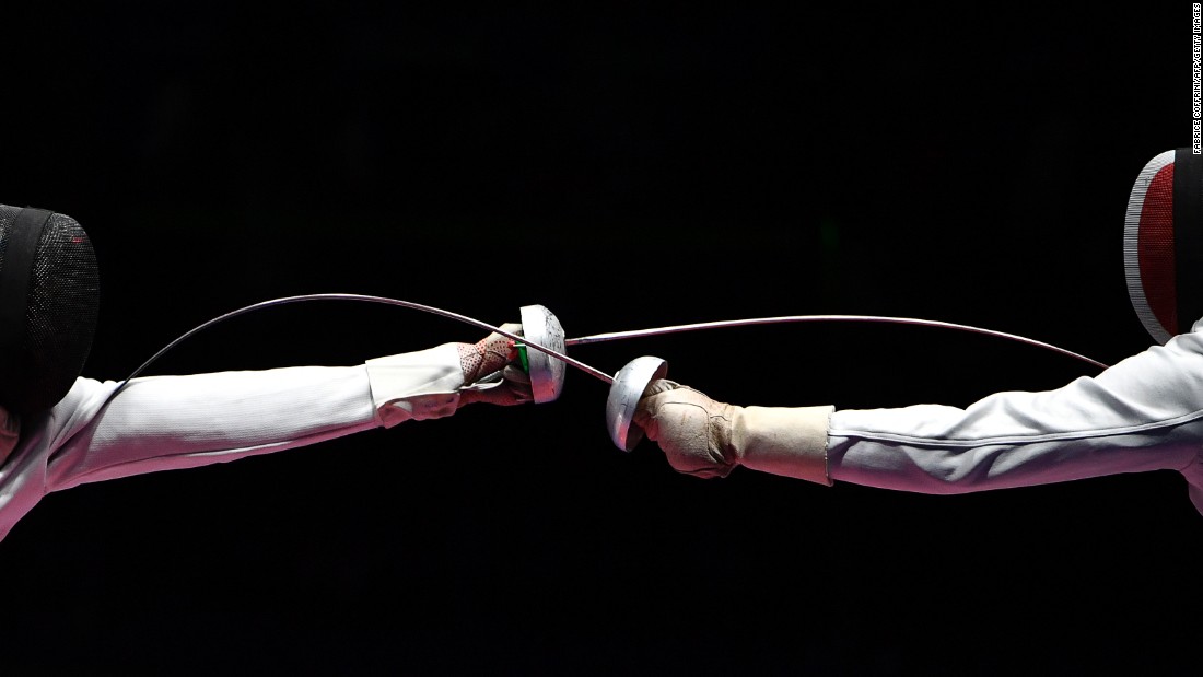 Hungarian fencer Geza Imre, left, competes against France&#39;s Gauthier Grumier during an epee semifinal. Imre won 15-13 to advance to the final, which he lost to South Korea&#39;s  &lt;br /&gt;Park Sang-young.