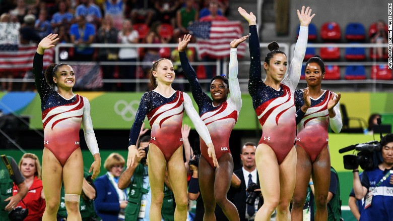 Lauren Hernandez, Madison Kocian, Simone Biles, Alexandra Raisman and Gabrielle Douglas of the United States wave to fans to celebrate winning the gold medal during the Artistic Gymnastics Women&#39;s Team Final Tuesday August 9. 