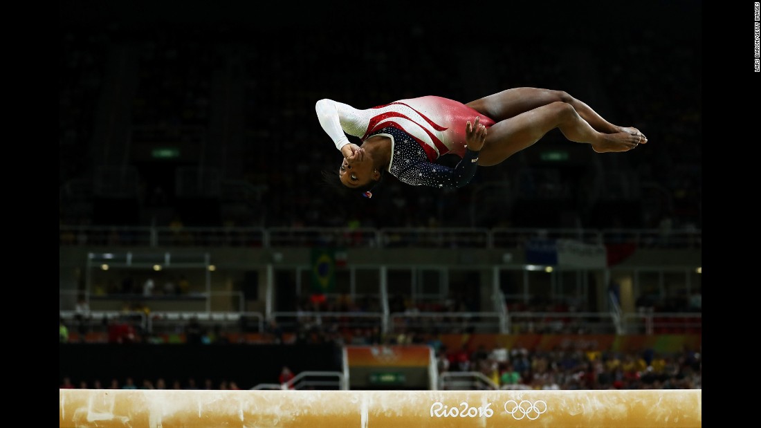 Experts call it the hardest balance beam dismount in gymnastics. Biles flips backward head-over-heels twice toward the end of the beam. Then she jumps backward off the end of the beam, flipping in mid-air twice before sticking the landing perfectly. 