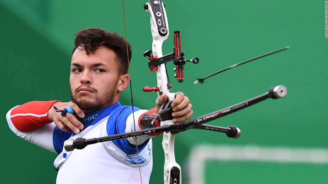 Italy&#39;s David Pasqualucci shoots an arrow during the individual archery competition.