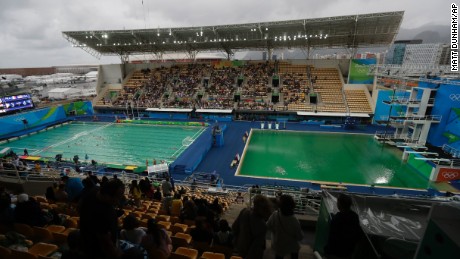 The water of the diving pool at right appears a murky green as the water polo pool at left appears a greener colour than the previous day.