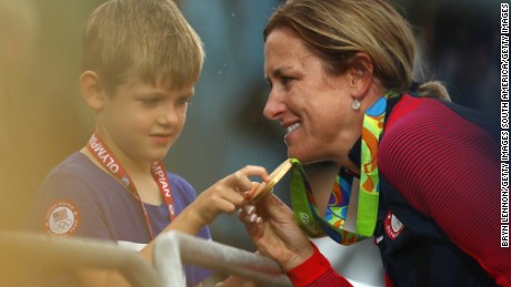 Kristin Armstrong celebrates with her 5-year-old son Lucas after winning gold.