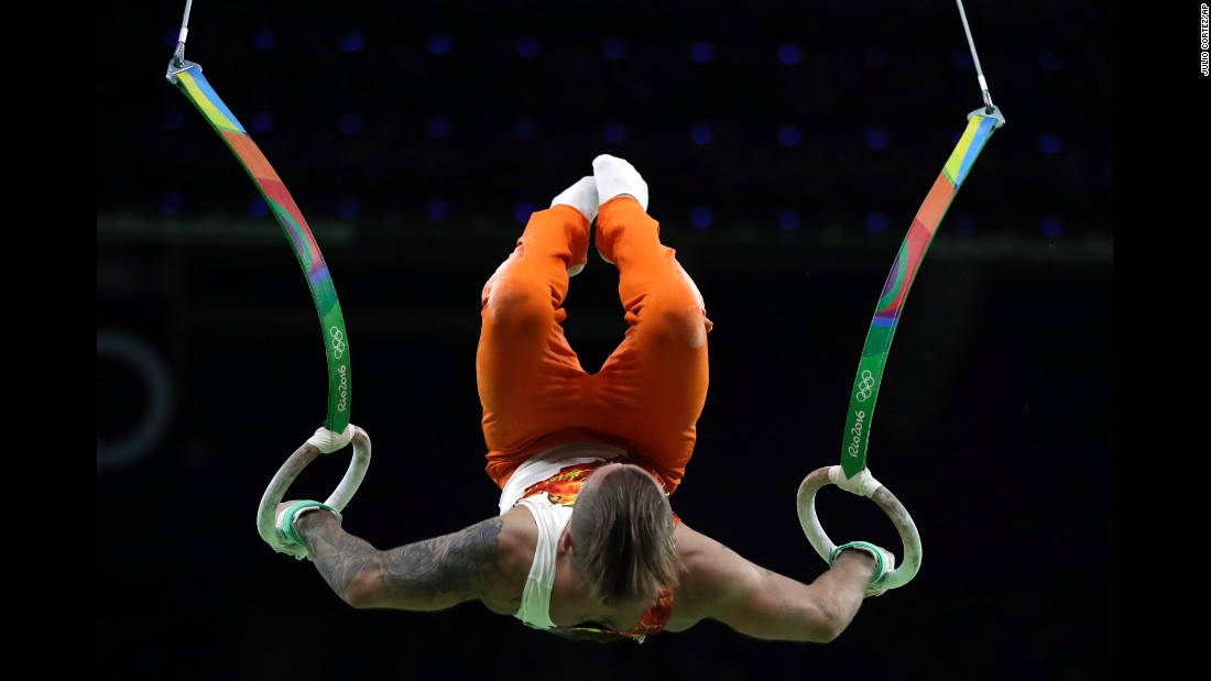 Azerbaijan&#39;s Oleg Stepko performs on the rings during the men&#39;s individual all-around.