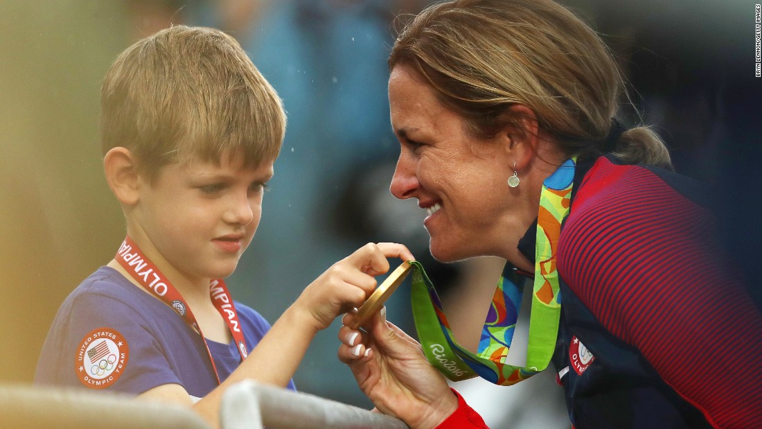 American cyclist Kristin Armstrong shows her gold medal to her son, Lucas, after &lt;a href=&quot;http://edition.cnn.com/2016/08/10/sport/kristin-armstrong-cycling-usa/index.html&quot; target=&quot;_blank&quot;&gt;winning the time trial&lt;/a&gt; for the third straight Olympics. Williams won the event a day before turning 43 years old. She was the oldest woman in the field by seven years.