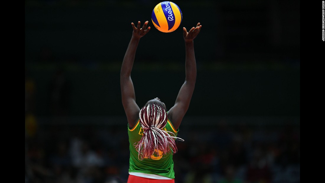 Madeleine Samantha Bodo Essissima plays a shot for Cameroon during a volleyball match against Russia.