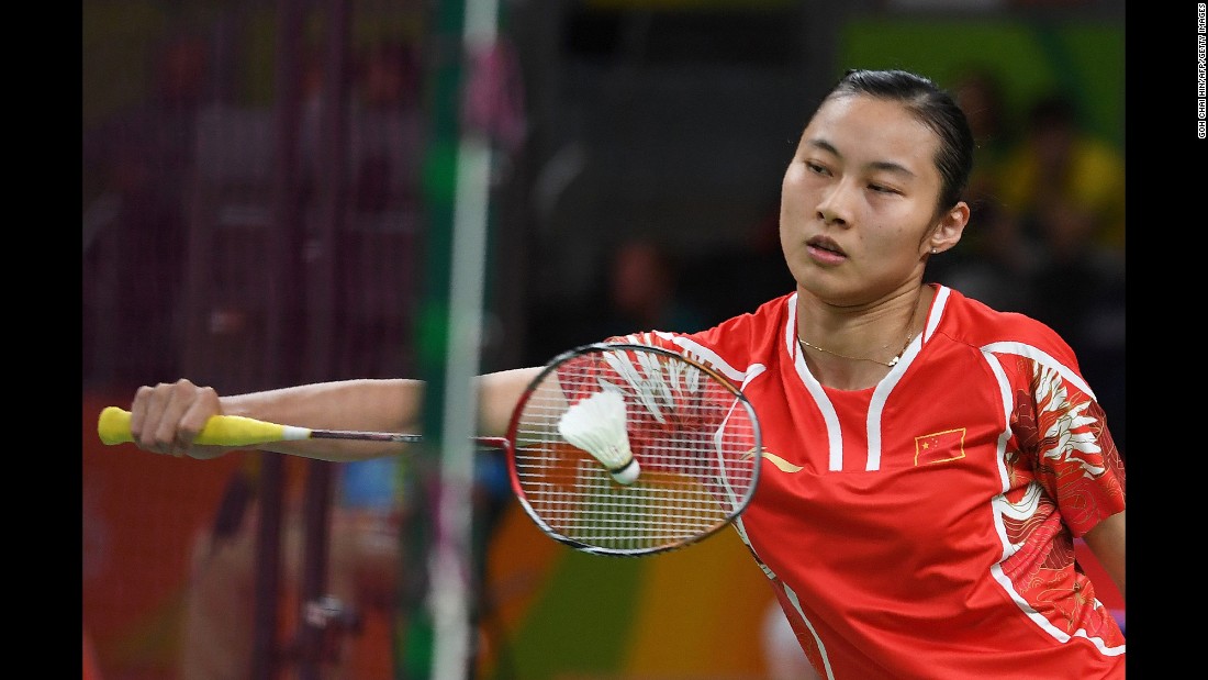 Chinese badminton player Wang Yihan returns a shot during a singles match against Ireland&#39;s Chloe Noelle Magee.
